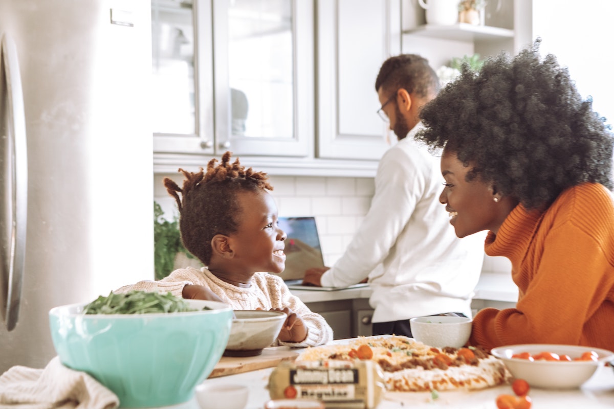 A family cooking together in the kitchen